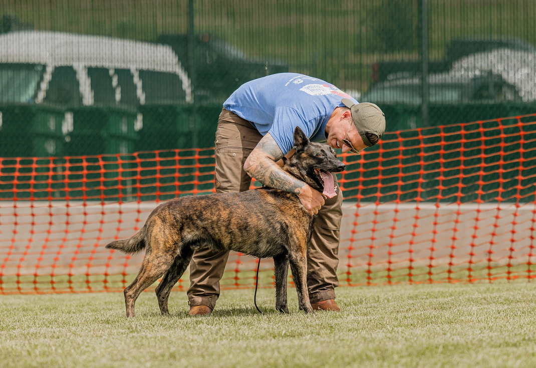 Handler with Malinois at trial